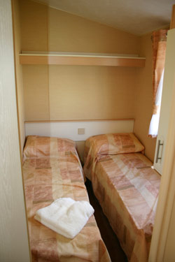 Twin bedroom in the Carnival holiday home