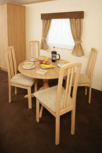 The dining are inside the Delta Denbigh Deluxe