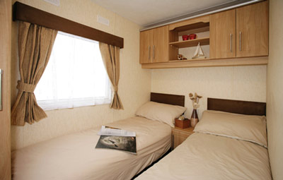 The twin bedroom in the Denbigh Deluxe