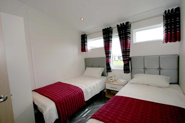 Large twin beds in bedroom