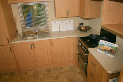 There is adequate worktop space and storage in the kitchen