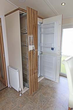 Victory Versailles holiday lodge fridge freezer & pull out storage racks