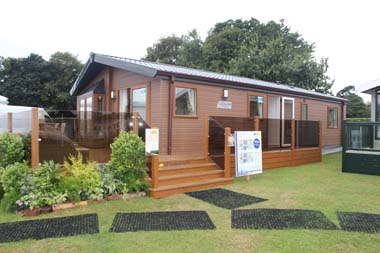 The Willerby Clearwater Series 2 holiday lodge with the optional Canexel cladding and bay window.