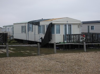 static caravan with roof damage