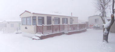 static caravan in the snow