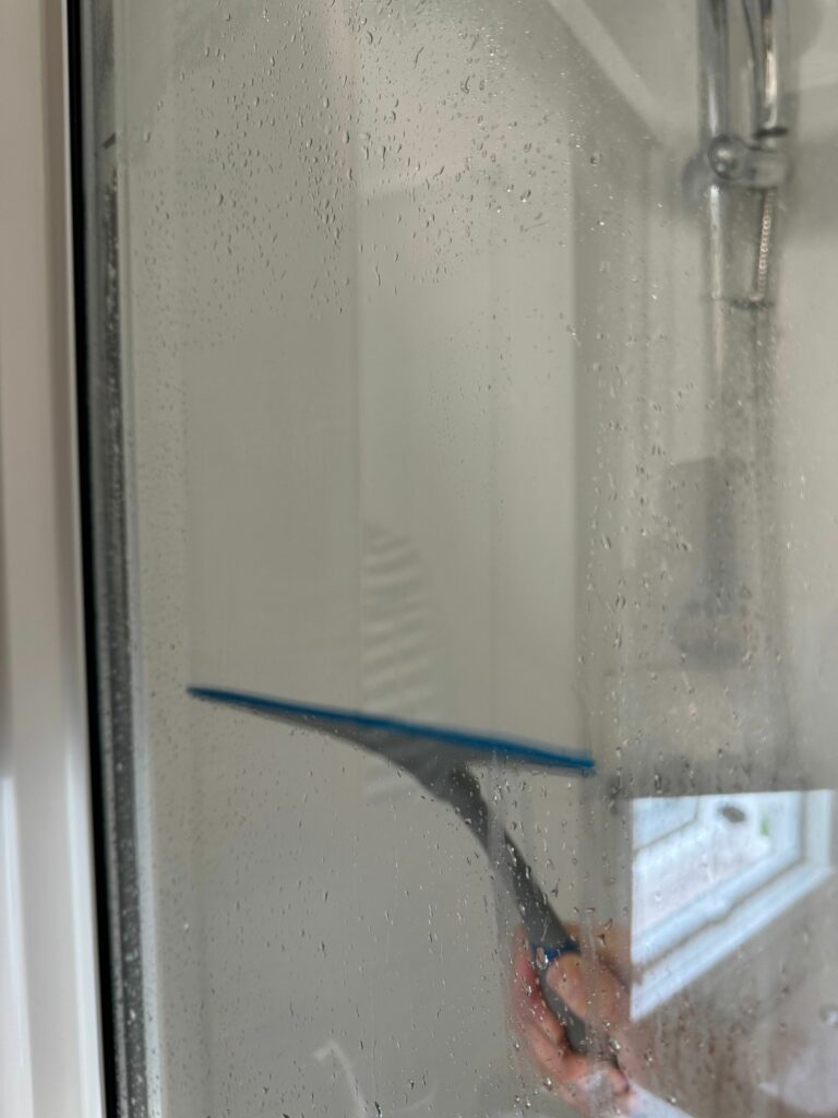 wiping shower to prevent damp