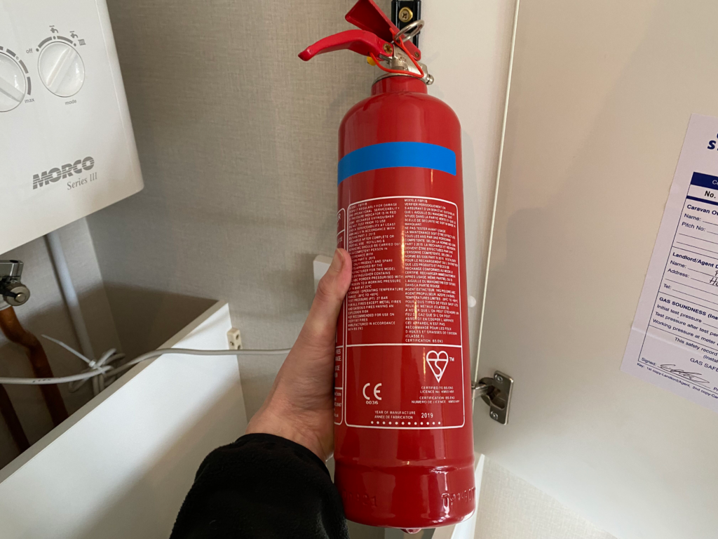 checking static caravan fire extinguisher