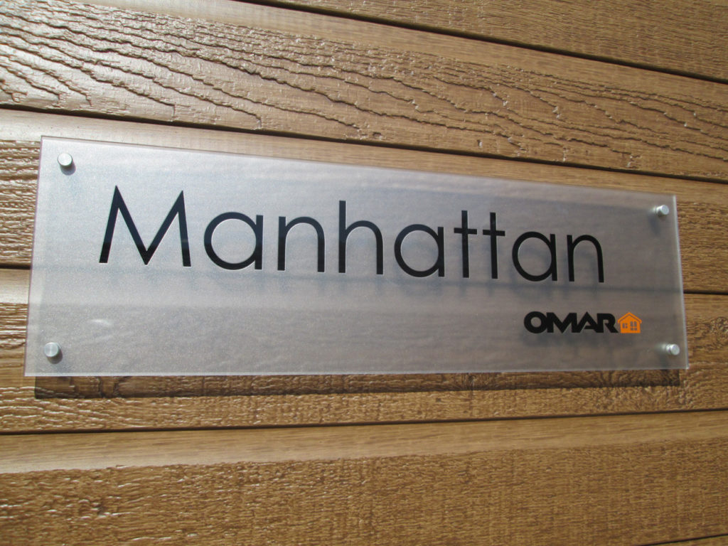 Omar Manhattan Sign