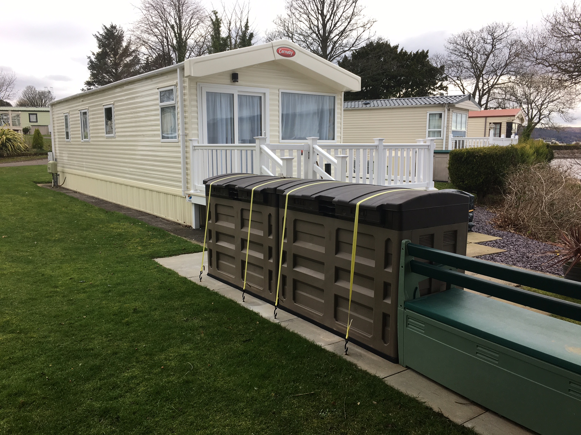 Strapping down outdoor storage box