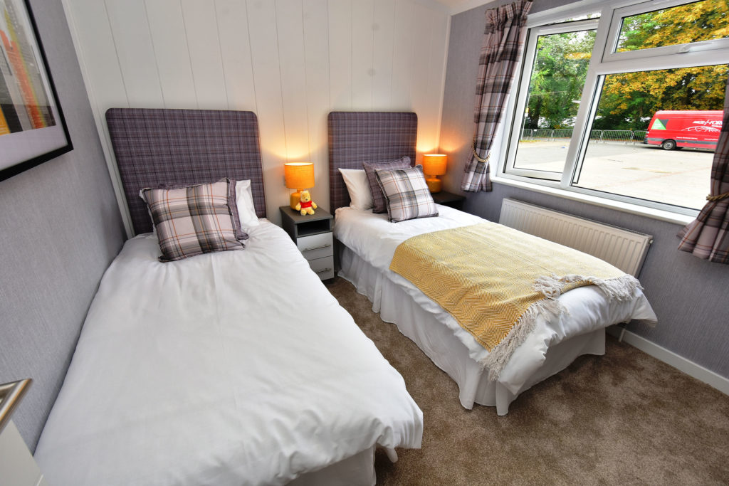 2019 Omar Alderney holiday lodge twin bedroom