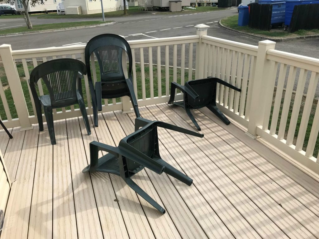 overturned furniture on decking