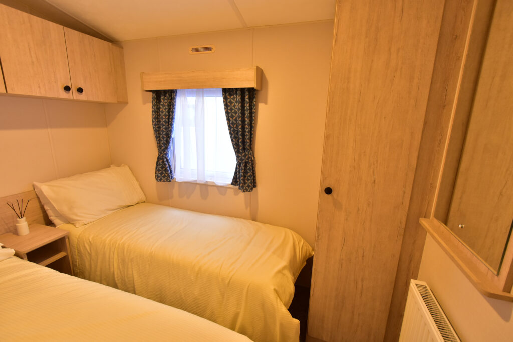 2026 Delta Saffron Deluxe static caravan twin bedroom